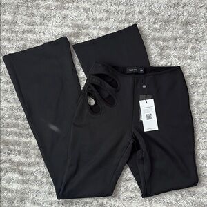 Trendy Black Flare Pants with Cutouts